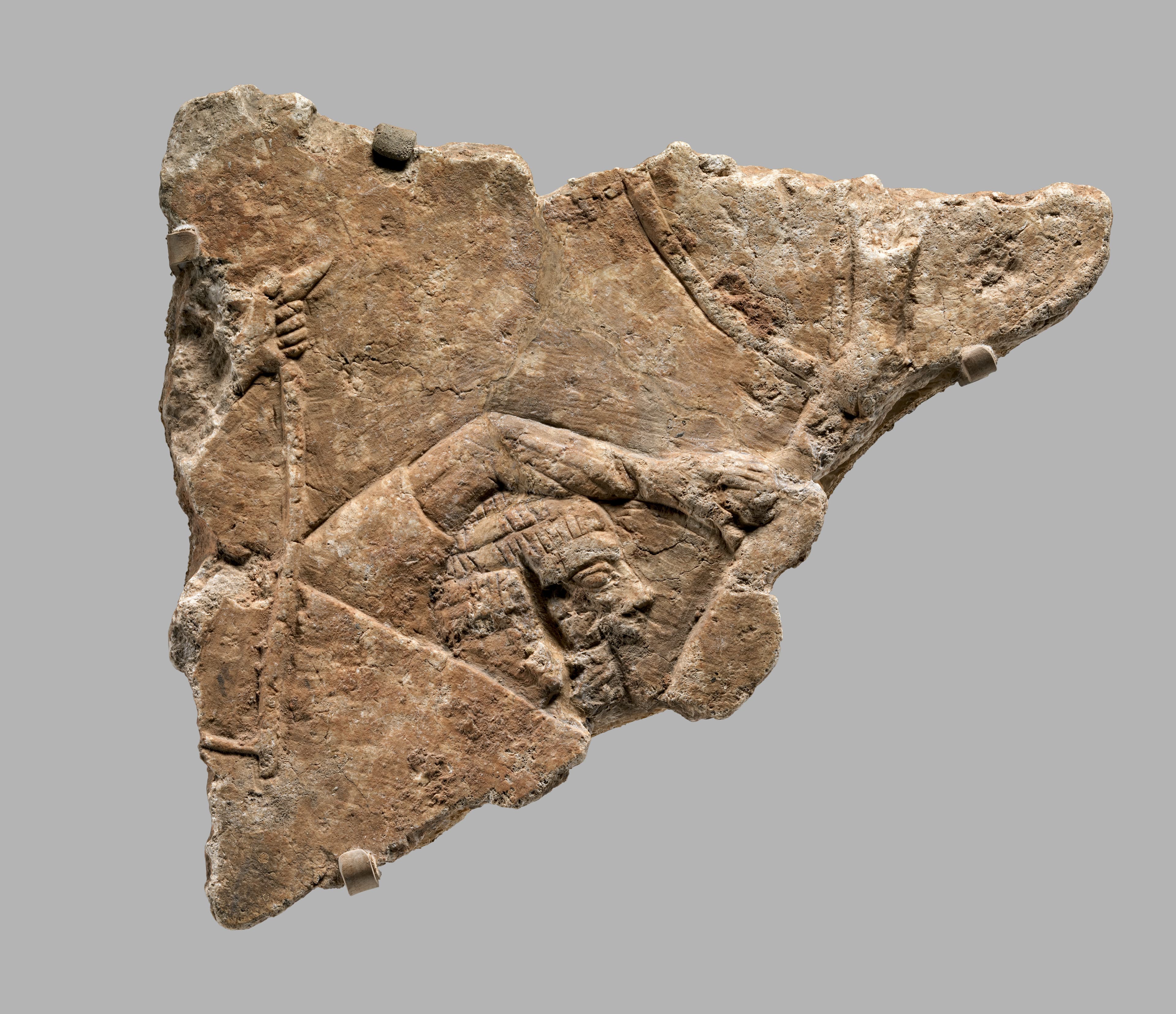 Relief: fragments of a siege scene